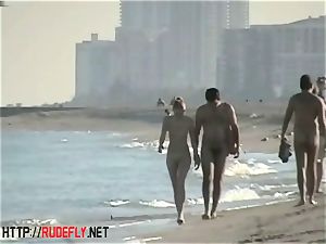 voyeurism at a scorching nudist couple on the beach